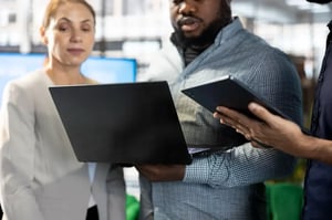 company-director-showing-shareholders-data-notebook