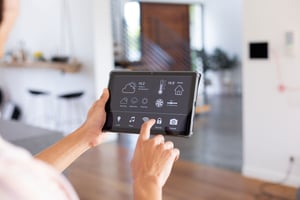 hands-biracial-man-home-using-tablet-with-smart-home-interface-screen-communication-technology-domestic-life-concept